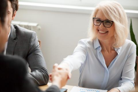 Woman man shaking hands