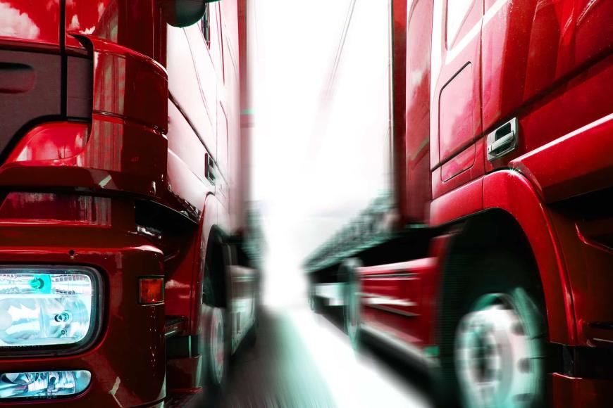 2 red trucks - shutterstock_33356107_2000x.jpg